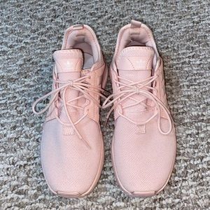 Adidas sneakers fits a women’s size 7 foot